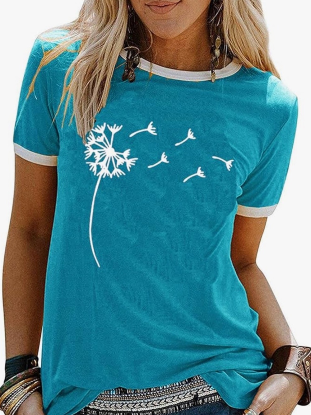 Bright teal short sleeve ringer tee. White dandelion graphic across the front. C